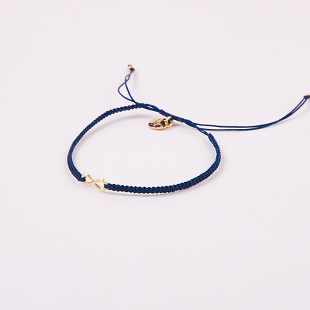 PULSERA INFINITY TEJIDO