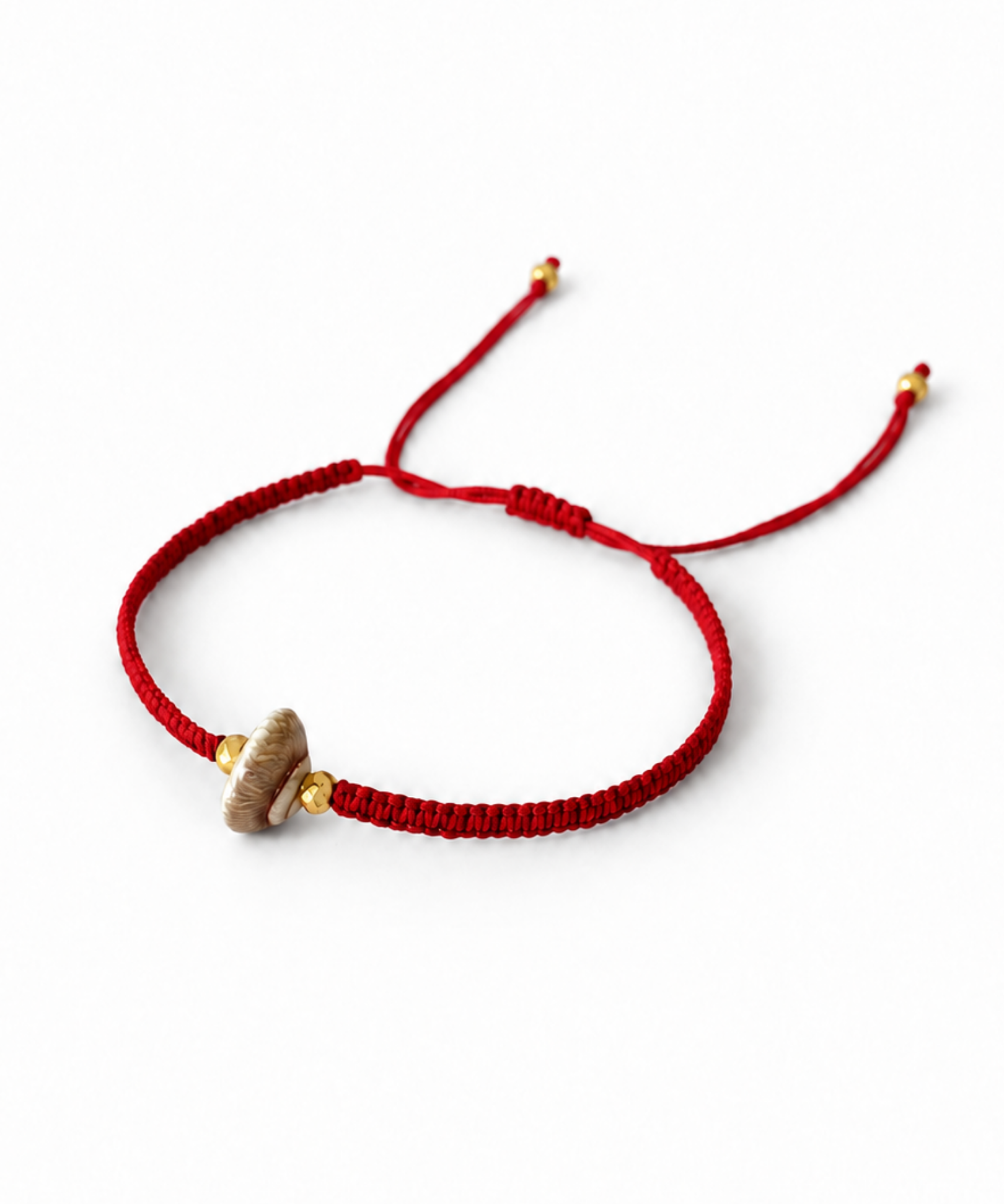 PULSERA CARACOL TEJIDO